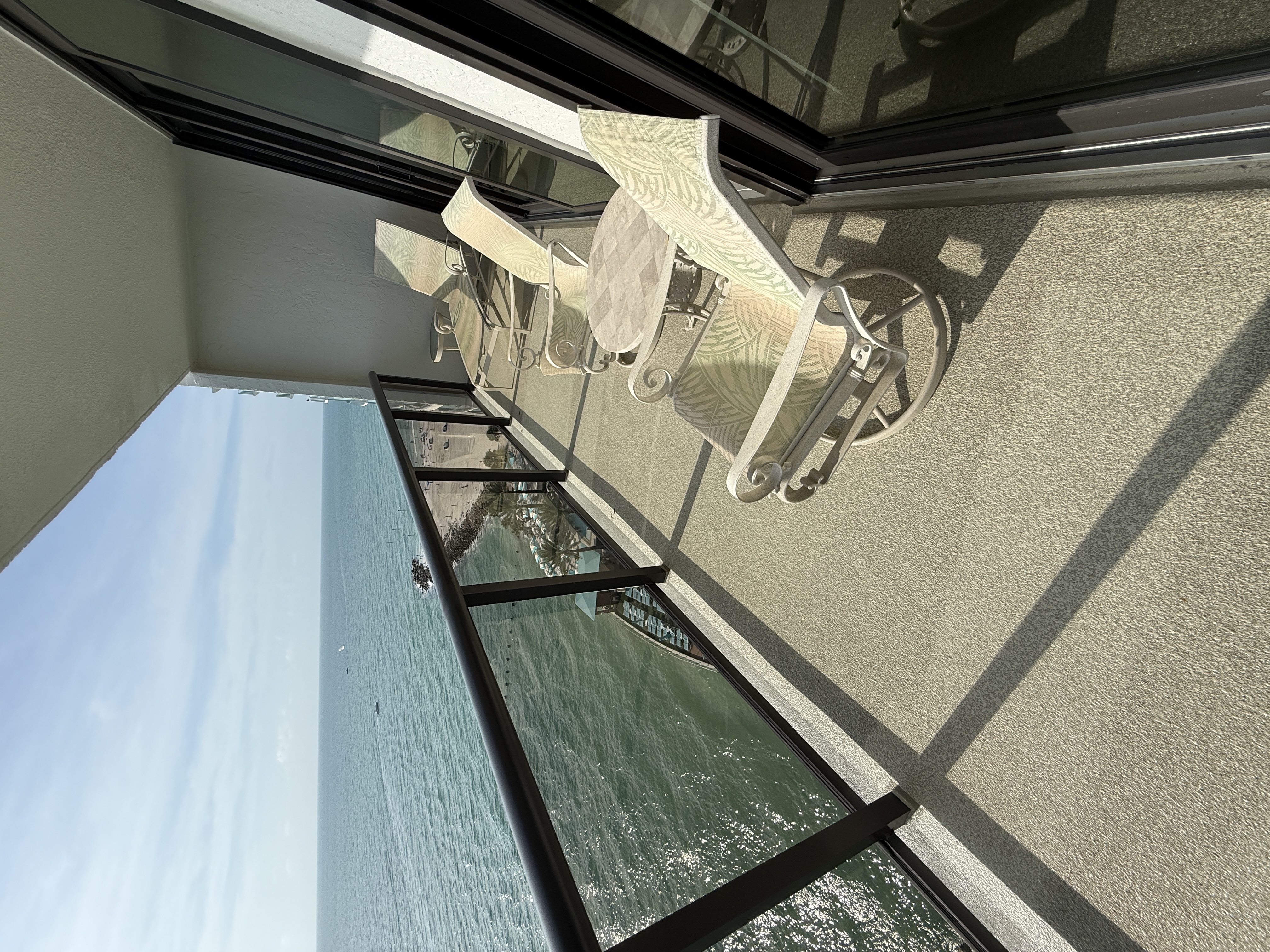 Balcony loungers overlooking the Gulf